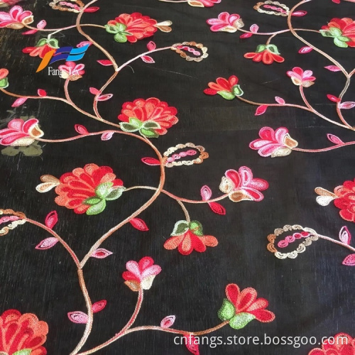 Robe de femme de broderie de fleur de Tokay africaine en tissu noir